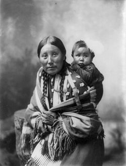 Stella Yellow Shirt, Dakota Sioux, with baby, by Heyn Photo, 1899. jpg