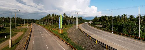 Maharlika Highway - Gov. Generoso Bridge Junction to Tagum (right) and to Carmen (left) Tagum carmen border.jpg