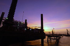 US Navy 050701-N-4309A-242 As the sun-sets over the Khawr Al Amaya Oil Terminal (KAAOT), another day passes safely under the watchful eye of masters-at-arms assigned to Mobile Security Detachment Two Five (MSD-25).jpg