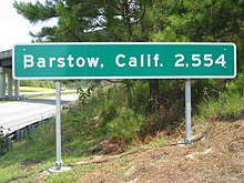 Barstow, California, distance sign near Wilmington. This sign was permanently removed in 2009 after being repeatedly stolen. WilmingtonBarstow.JPG