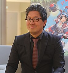 A photograph of the game's producer, Yuki Naka, in 2015