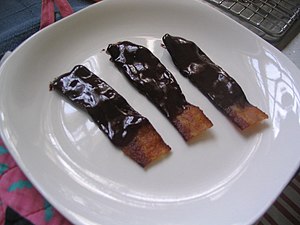 English: Applewood-smoked bacon covered in ganache