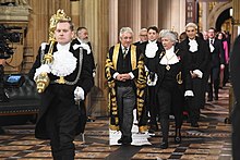 The procession in October 2019 Commons procession to Lords chamber 2019.jpg