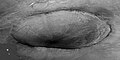 تصویر گرفته شده توسط مدارگرد شناسایی مریخ که فرود آمدن کاوشگر فینیکس را در یک دهانه نشان می‌دهد.