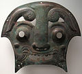 Plaque de char de guerre[7] en forme de masque. Zhou occidentaux. Musée Guimet Paris