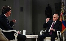 Carlson interviewing Russian president Vladimir Putin in February 2024 Interview with Vladimir Putin to Tucker Carlson (2024-02-06) 04.jpg
