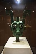 Two-faced bronze mask