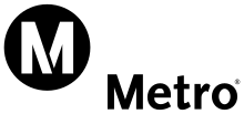 Le logo du métro, sphérique, représente la lettre M sur un fond noir.