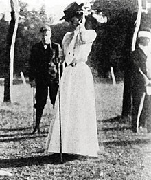 Margaret Abbott competing in golf. Abbott was the first American woman to win an Olympic event. Margaret-abbott-gold-medal-1900-golf.jpg