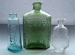 Dalby's Carminative, Daffy's Elixir and Turlington's Balsam of Life bottles dating to the late 18th and early 19th centuries. These "typical" patent or quack medicines were marketed in very different, and highly distinctive, bottles. Each brand retained the same basic appearance for more than 100 years. Three early medicine bottles.jpg