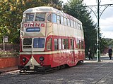 Hey, what's with that clock on the pole at this British trolley stop?