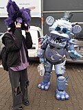 Freddy Fazbear cosplayer (right)