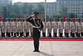Sailors in the battalion as well as the commander stand at attention during Donald H. Rumsfeld's visit to Beijing, 19 October 2005.