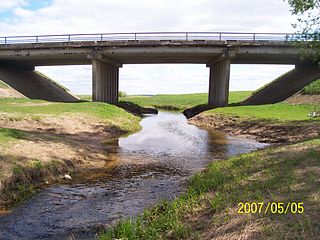 The river Lankesa at the Nartautai-Zeimiai road bridge