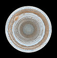 Image 4 Polar map of Jupiter Photo cr: Cassini orbiter This polar map of Jupiter, taken by the Cassini orbiter as it neared Jupiter during a flyby on its way to Saturn, is the most detailed global color map of the planet ever produced. The south pole is in the center of the map and the equator is at the edge. The map shows a variety of colorful cloud features, including parallel reddish-brown and white bands, the Great Red Spot, multi-lobed chaotic regions, white ovals, and many small vortexes. Many clouds appear in streaks and waves due to continual stretching and folding by Jupiter's winds and turbulence. More selected pictures