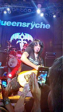 Sarzo performing with Geoff Tate in 2013