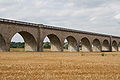 The lowered arches of the viaduct on the left bank.