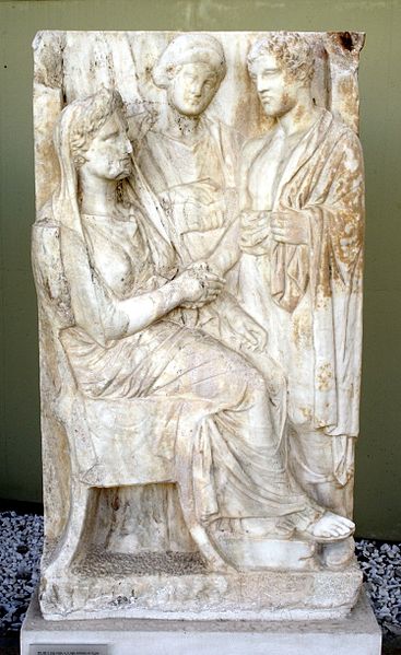 Woman greeting her son; between them, a female slave (4th century BCE)