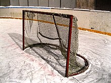 Goalposts in ice hockey may be knocked from their moorings during a game. Ice hockey goal 2014.JPG