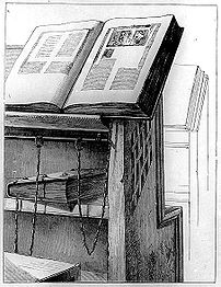 Desk with chained books in the Library of Cese...