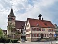 Evangelische Pfarrkirche St. Oswald mit ummauertem Friedhof und Gefallenen-Denkmal (Sachgesamtheit)