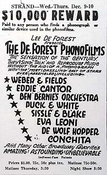 All-text advertisement from the Strand Theater, giving dates, times, and performers' names. At the top, a tagline reads, "$10,000 reward paid to any person who finds a phonograph or similar device used in the phonofilms." The accompanying promotional text describes the slate of sound pictures as "the sensation of the century...Amazing! Astounding! Unbelievable".