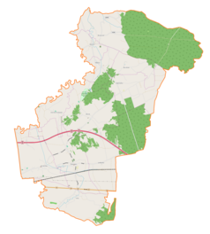 Mapa konturowa gminy Rzezawa, u góry znajduje się punkt z opisem „Parafia pw. Narodzenia Najświętszej Maryi Pannyw Okulicach”