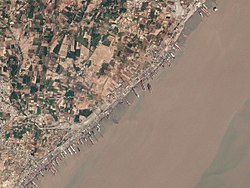 Ships anchored at Alang for scrapping, Satellite view, 17 March 2017