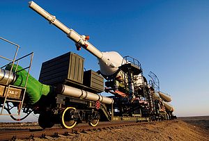 Soyuz TMA-11 spacecraft carried on a flatcar