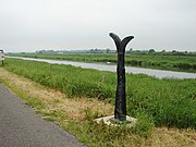 Sustrans signpost on long distance cyclepath next to Witham, once the main railway line