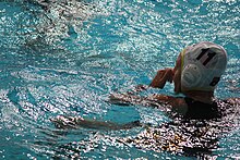 woman swimming in pool