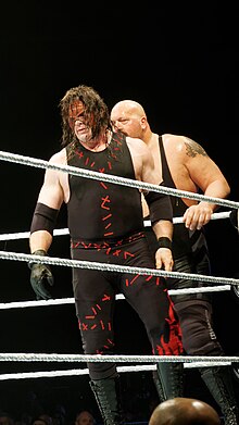 Kane reformed his alliance with Big Show during a feud with The Wyatt Family in 2016 WWE Live 2016-04-21 22-15-51 ILCE-6300 2552 DxO (29160255881).jpg