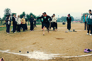 Muong women in Hoa Binh, Vietnam playing game ...