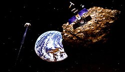 Artist's concept of asteroid mining Asteroidmining.jpg