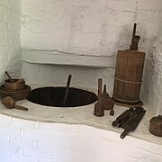 Basin, located in the west room to the right of the rear of the oven