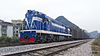 DF5 locomotive number 1295 pulls a freight train near Guilin Station in 2017