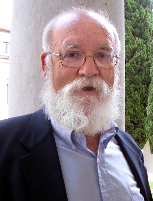 Dennett wearing a button-up shirt as well as a jacket