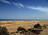 Zicht op de duinen en de oceaan