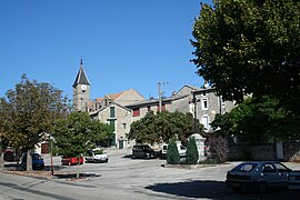The church and surrounding buildings in L'Hospitalet-du-Larzac