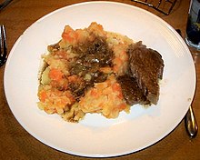 Hutspot with beef stew on plate Hutspot met stooflap op bord.JPG