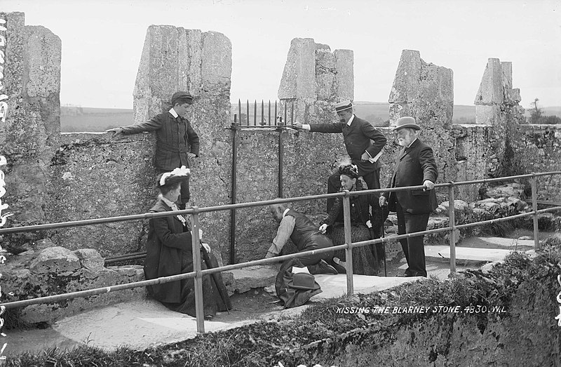 File:Kissing the Blarney Stone 1897.jpg