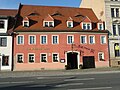 Gasthof Zum Goldenen Anker in geschlossener Bebauung, mit zwei Seitenflügeln zum Hof und Hinterhaus