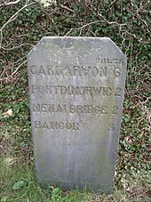 Slate milestone near Bangor, Wales Milestone@Penrhosgarnedd 2.jpg