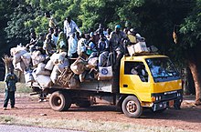 Migrants
on a truck between Niamey and Koure in Niger (2007) Niger highway overloaded camion 2007.jpg