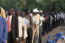 Southern Sudanese wait to vote during the 2011 South Sudanese independence referendum. Southern Sudan Referendum1.jpg