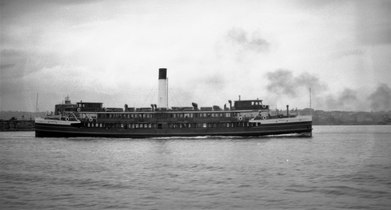1930s or 1940s after her upper decks were enclosed.