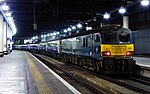 Caledonian Sleeper with 92038 in Serco midnight teal livery, at Euston, April 2015