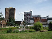The Chancellor's Lake at the heart of the campus with triangular fountain in 2010. Aston University Lake 2010.JPG