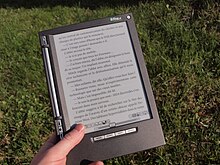 iLiad e-book reader equipped with an e-paper display visible in sunlight Bouquin electronique iLiad en plein soleil.jpg