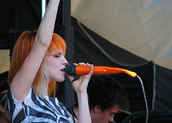 Lead vocalist Hayley Williams (front) and temporary guitarist Taylor York (right) perform at the Vans Warped Tour in Vancouver, July 2007.